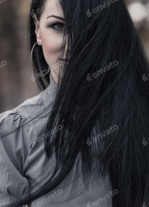 Preview: Woman Face With Long Black Hair. Hairstyle Or Hairdoo On Wind. Close Up Female