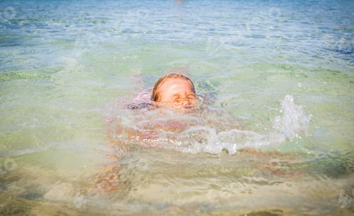 Preview: Little Girl Swimming In The Sea. Summer Travel Vacation