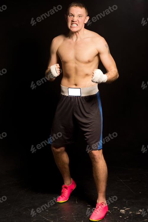 Preview: Young Boxer Gnashing His Teeth At His Opponent Showing His Determination To Win At All Costs As He