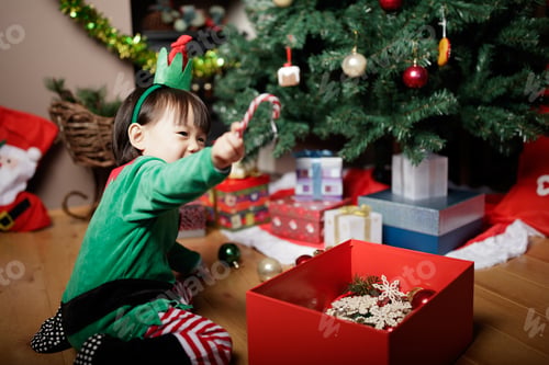Preview: Toddler Baby Girl Dressing Up And Helping Decorating Christmas Tree