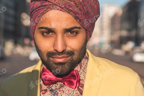 Preview: Portrait Of An Indian Young Handsome Man Posing In An Urban Context