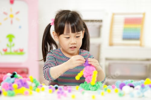 Preview: Young Girl Playing Creative 3D Shape Toy For Homeschooling