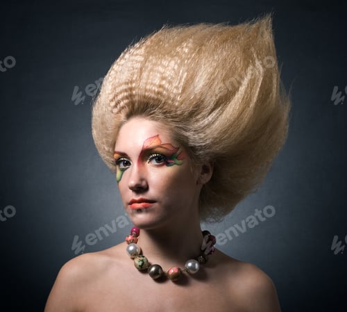 Preview: Young Charming Woman In Face-Art. A Beautiful Woman In The Autumn Image.