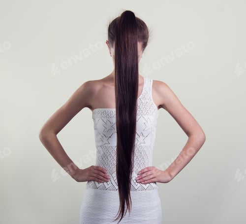 Preview: Woman Wearing White Dress Showing Long Brown Hair
