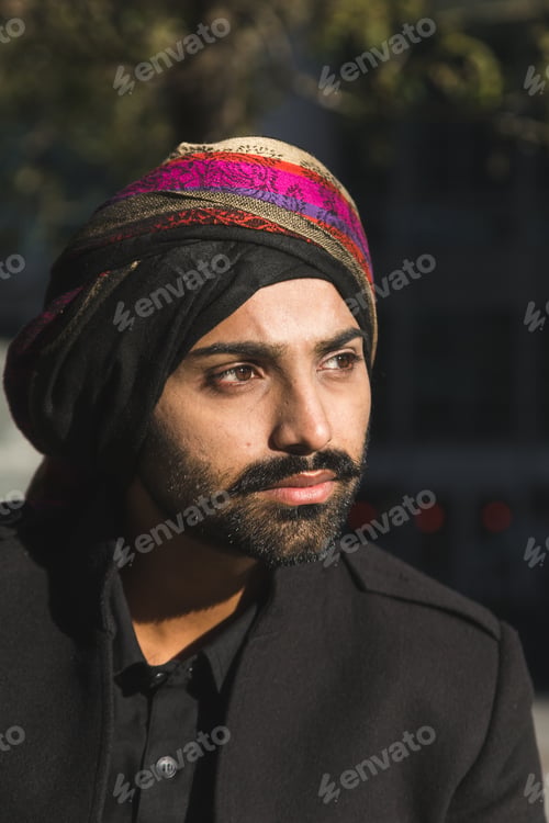 Preview: Handsome Indian Man Posing In An Urban Context. Street Fashion And Style.