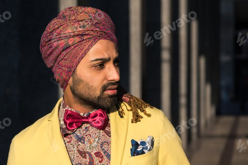 Preview: Portrait Of An Indian Young Handsome Man Posing In An Urban Context