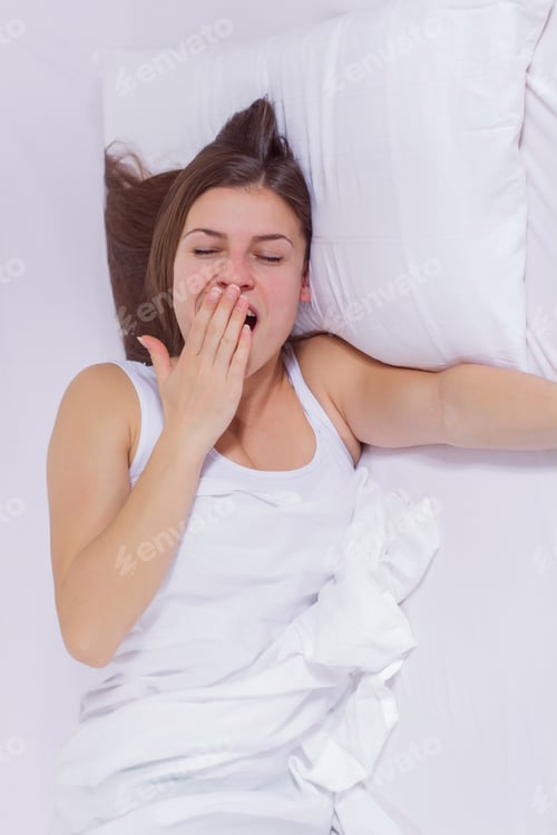 Preview: Waking Up, Young Woman Yawning And Stretching In The Bed.