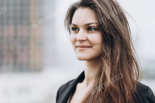 Preview: Woman with Brown Hair Wearing Black Blazer