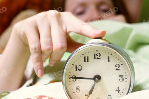 Preview: Alarm Clock Disturbing A Sleeping Woman That Is Defocused