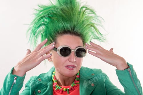 Preview: A Caucasian Girl In A Green Dress And With Green Hair Is Preparing For The Holidays. Suit Of The