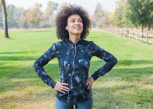 Preview: Sporty African American Woman Listening Music After Exercise In Park And Ready For Continue.