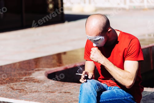 Preview: Man Mime Smokes A Cigarette In Town