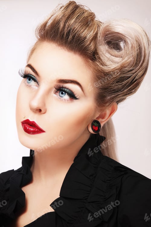 Preview: Portrait Of Young Beautiful Woman With Stylish Make-Up And Fancy Hairdo