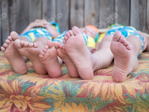 Preview: Funny Children In Swimsuits Lie Together On Mattress After Swimming In Pool. Boys Are Happy On