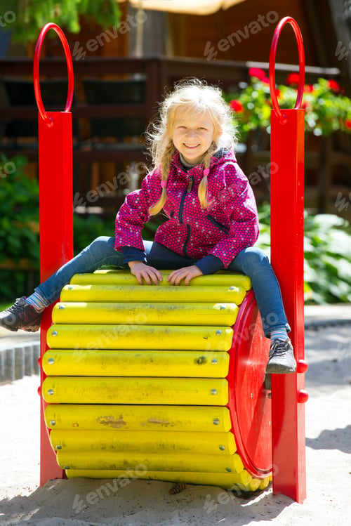 Preview: Smiling Little Girl At The Playground