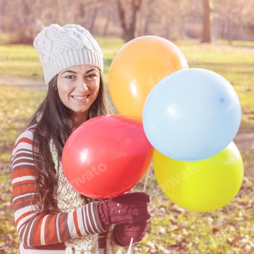 Preview: Happy Young Woman With Colorful Balloons At Beautiful Sunny Autumn Day. Carefree Female Lifestyle