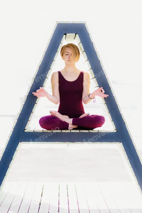 Preview: The Girl Is Sitting In A Lotus Pose In A Triangular Figure