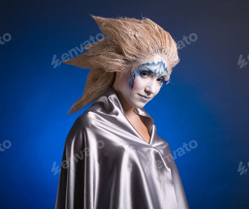 Preview: Portrait Of Winter Woman With A Stylish Visage And Snowy Hair.