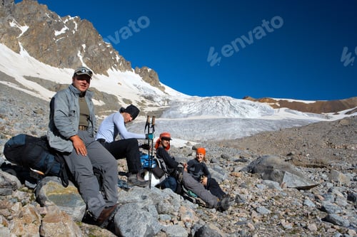 Preview: Group Of Hikers Taking A Rest After Rising