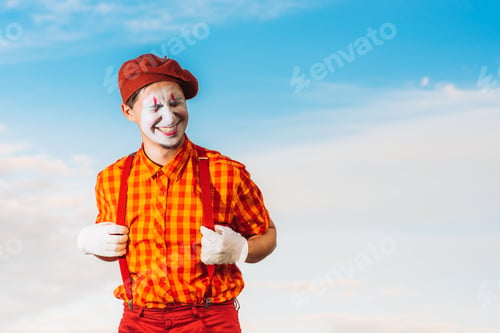 Preview: Actor Shows Pantomime Against The Blue Sky