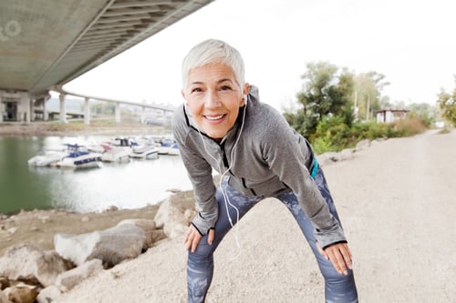 Preview: Senior Woman Relax Listening Music With Earphones After Running, Gray-Short Hair, Wear Sports