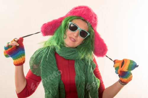 Preview: A Crazy Caucasian Girl Trying On Various Hats For The Christmas Fun Carnival. The Concept Of