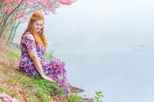 Preview: Beautiful Woman With Red Hair In Autumn Park , Near The Lake