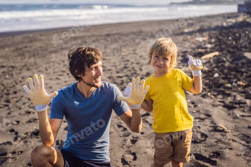 Preview: Dad And Son Are Cleaning Up The Beach. Natural Education Of Children