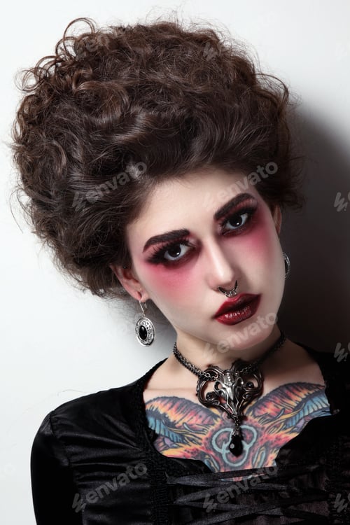 Preview: Portrait Of Young Beautiful Girl With Vintage Hairdo And Gothic Make-Up