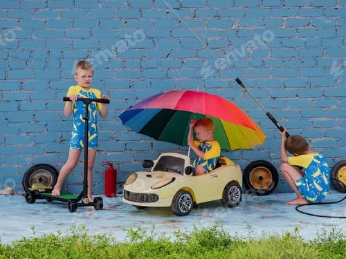Preview: Funny Children In Boys' Bathing Suits Posing In Front Of Camera With High-Pressure Car Wash And Toy