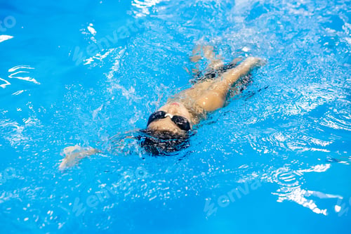 Preview: Baby Boy Swimming In The Pool.Cute Happy Little Boy In Goggles Swimming And Snorking In The