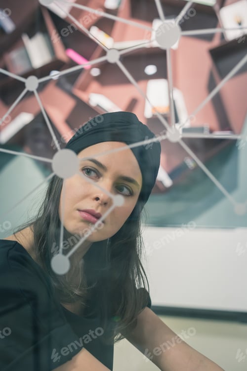 Preview: Beautiful Young Brunette With Turban Posing Behind A Virtual Screen