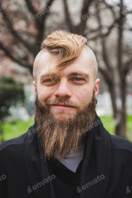 Preview: Stylish Young Bearded Man Posing In An Urban Context
