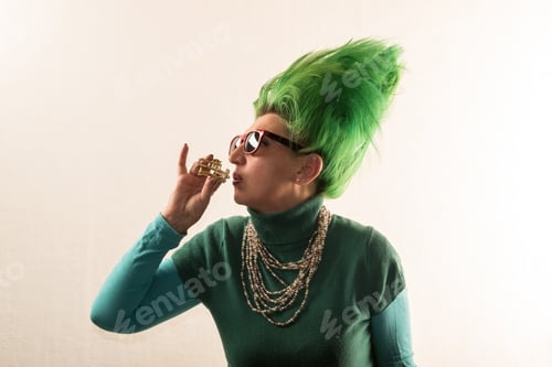 Preview: Splendid Girl With Green Hair Dressed In Christmas Garlands. A Girl Is Depicting A Christmas Tree