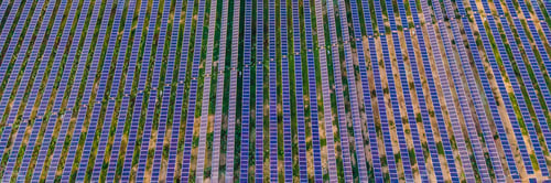 Preview: Aerial View Of The Solar Panel In Solar Farm For Green Energy Banner, Long Format