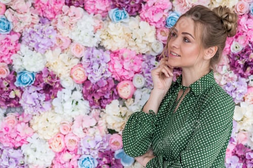 Preview: Profile Portrait Of Pretty Blonde Girl Against A Floral Background