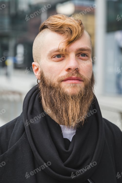 Preview: Stylish Young Bearded Man Posing In An Urban Context