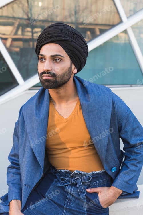 Preview: Handsome Indian Man Posing In An Urban Context. Street Fashion And Style.