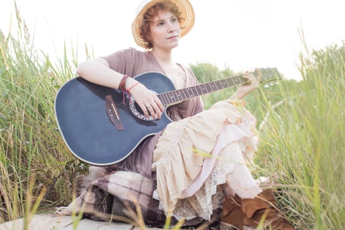 Preview: Redhead Woman With Guitar