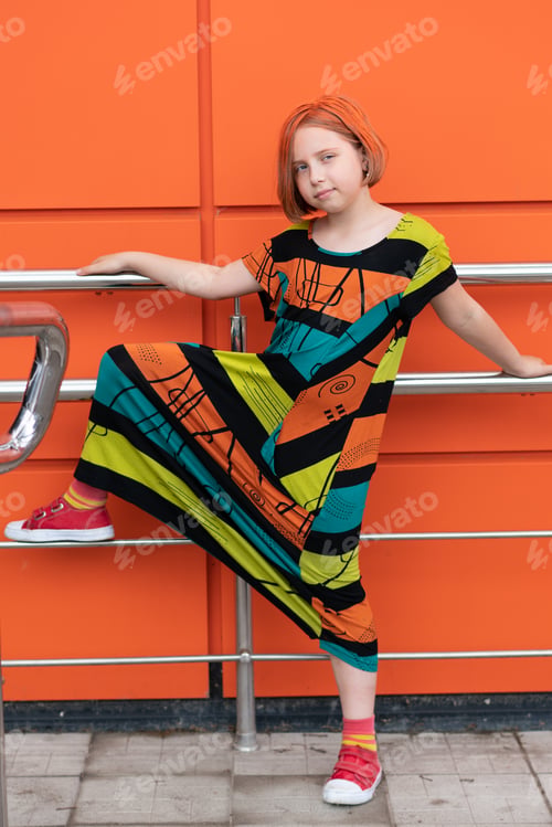 Preview: Little Girl Posing Outside In The City, Standing In A Colored Dress