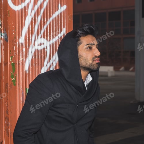 Preview: Portrait Of A Young Handsome Indian Man Posing In An Urban Context