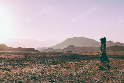 Preview: Beautiful Young Woman In Timna, Desert In Israel. Rocks In Sunset Time. Mystic Concept