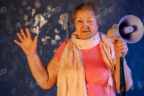 Vista previa: Beautiful Senior Woman Is Excited, Euphoric, Screaming With Megaphone, Sign Of Revolution And