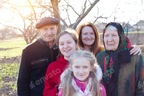 Preview: Big Happy Family. Portrait Of Smiling Senior Man And Granddaughter With Great Granddaughters