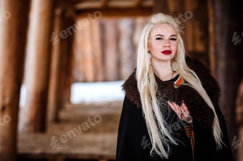 Preview: Beautiful Young Woman Holding A Viking With Blond Hair. Image Of Historical Figure