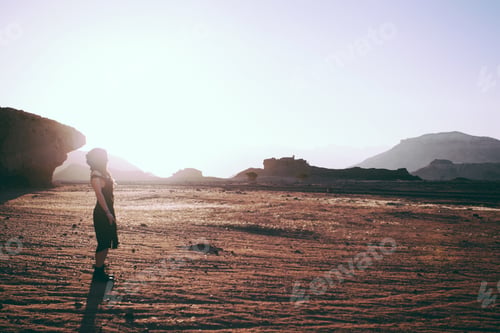 Preview: Beautiful Young Woman In Timna, Desert In Israel. Rocks In Sunset Time. Mystic Concept