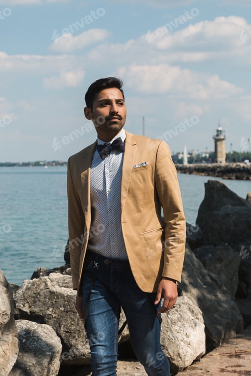 Preview: Handsome Indian Man Posing In A Vacation Context. Street Fashion And Style.