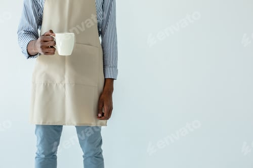 Preview: Thats For You. Nice Afro Americn Barista Holding A Cup Of Coffee While Waiting For Guests