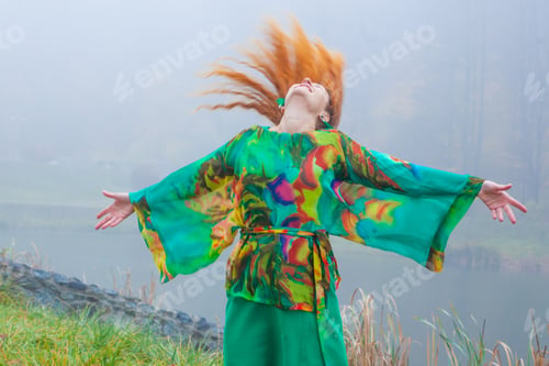 Preview: Woman With Red Hair In Green Fress, In Autumn Park
