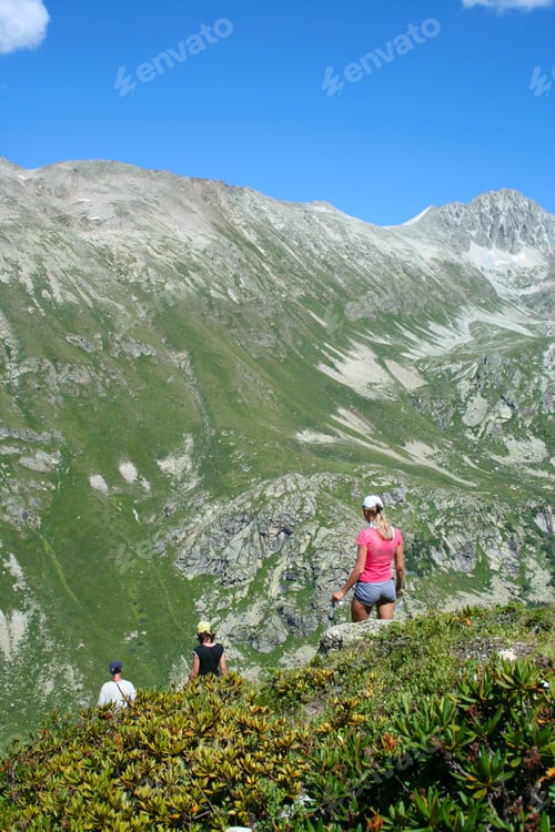 Preview: Three Hikers Are Descending To The Valley